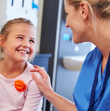 Nurse organizing camper medications